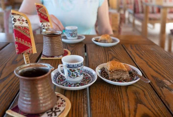 Gordijnen Turkish coffee and baklava on the table, tatar food © Travel Faery