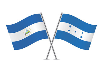The Republic of Nicaragua and Honduras crossed flags. Nicaraguan and Honduran flags on white background. Vector icon set. Vector illustration.