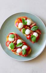 Bruschetta with mozzarella, tomatoes and basil. Vegetarian food. Healthy eating.