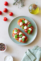 Bruschetta with mozzarella, tomatoes and basil. Vegetarian food. Healthy eating.