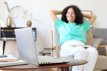 Woman relax and smile at home after work	
