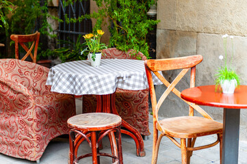Chairs and table on empty terrace at cafe .