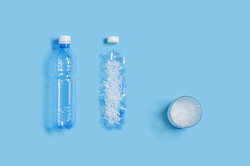 Glass of water with microplastic particles instead of clean water, plastic pollution concept,...