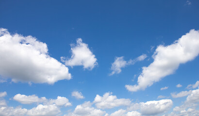 Naklejka na ściany i meble View of beautiful blue sky with white clouds.