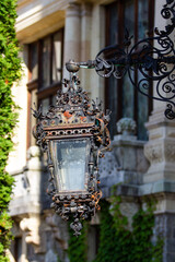 Fototapeta na wymiar Old vintage lantern in the palace garden