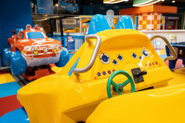 Bright arcade attractions cars for children entertainment in amusement park