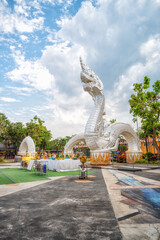 Big White Naga Statue beside Mekong river with blue sky, a tourist attraction at Kaengkabao, Mukdahan province Thailand.Amazing Thailand.
