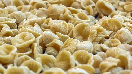 Close-up image of fresh handmade Apulian orecchiette pasta. Typical Italian pasta recipe