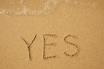 Yes - handwritten on the soft beach sand.