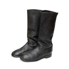 Old military boots made of leather on white background, black army boots isolated on white, combat and ceremonial shoes of a soldier of the army of the Soviet Union