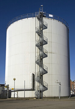 Industrial oil storage tank in urban area