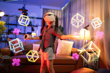 vr technology entertainment at home concept.asian child girl enjoy metaverse gaming with wearable vr headset with control handle playing sport gaming online in living room at home
