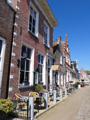 The Voorstreek street with restaurants and cafes in (Dutch) Sloten (Frisian) Sleat, Friesland, Netherlands