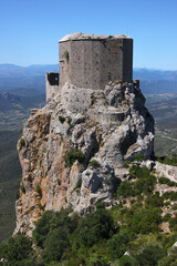 Fototapeta na wymiar Medieval Quéribus castle on top of a rocky mountain summit near Cucugnan village, Occitanie region in France