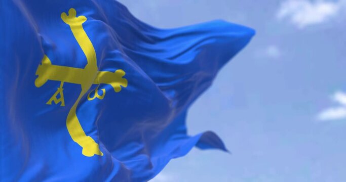 Asturias flag waving in the wind on a clear day