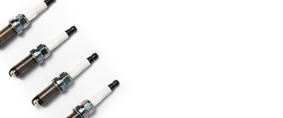 Four car candles on a white background. Top view, flat lay. Banner