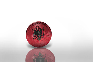 bitcoin with the national flag of albania on the white background. bitcoin mining concept.