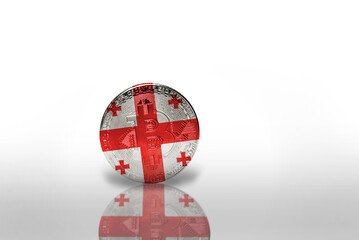 bitcoin with the national flag of georgia on the white background. bitcoin mining concept.