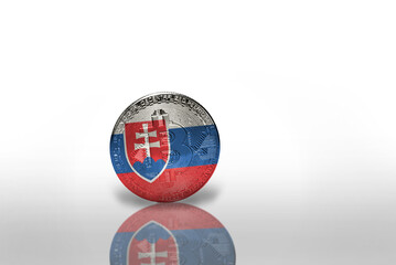 bitcoin with the national flag of slovakia on the white background. bitcoin mining concept.