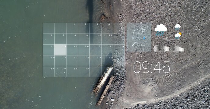 Digital interface with data processing over aerial view of sea and land - Powered by Adobe