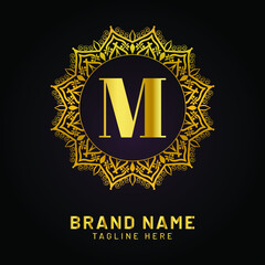 luxury letter m logo with golden color