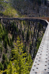 train trestle or railway bridge in Myra Canyon on the old Kettle Valley right of way near Kelowna, BC Canada - travel and tourism