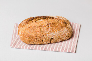 Fresh homemade crisp bread on napkin, top view. Healthy unleavened bread. French bread. Top view Bakery products