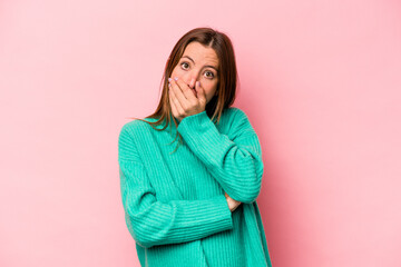 Young caucasian pregnant woman isolated on white background scared and afraid.