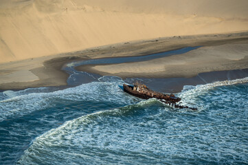 remains of ancient shipwreck washed up on the skeleton coast