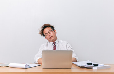 Asian business man sitting and working and stressed