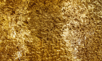 Precious Foil. Rough structure mineral. Rock texture.Gold texture. Golden Ore rocks. Stone background. Abstract texture. Rock pile. Stone texture. Structure. Shimmering surface.