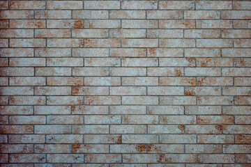 Beige brick tiles texture background backdrop.