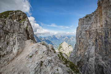 Fototapeta premium Beautiful nature. Mountain hiking Trail Road. Italy Malga Montasio Forca Disteis