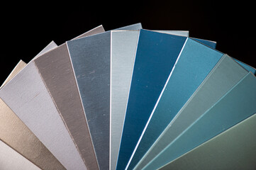 Aluminum profile section with color samples. Powder coating services