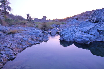 the place is beautiful , with mountains, rocks , small fish