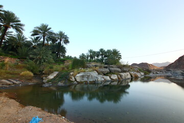 the place is beautiful , with mountains, rocks , small fish