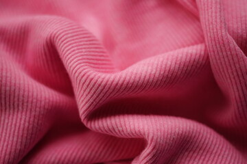 jersey pink fine ribbed pattern, soft wrinkled fabric.