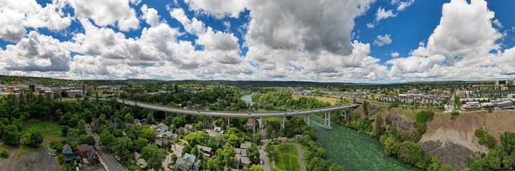 Panorama view of Spokane, WA cityscape with view of Maple St Bridge and Spokane River during the...