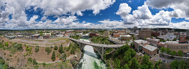 Panorama view of Spokane, WA cityscape with view of Monroe St Bridge and Spokane River during the...