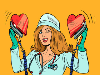 Defibrillator. The nurse resuscitates the heart. Love romance, valentine symbol - obrazy, fototapety, plakaty