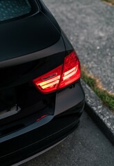 Rear tail light on a black car