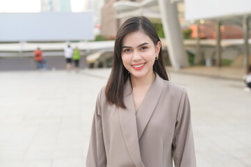 A portrait of beautiful smiling Businesswoman in modern City , people lifestyle concept