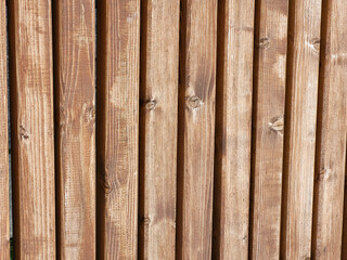 Brown wooden boardwalk. Beautiful rustic wooden background