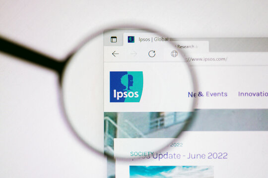 June 13, 2022, Brazil. In this photo illustration, the homepage of the Ipsos Group website seen on a computer screen through a magnifying glass.