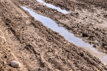 wet soil mud on an agricultural field