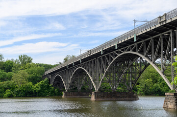 Fototapeta na wymiar Philadelphia, PA USA 6-3-2022 Stawberry Mansion Bridge looking east across the Schuylkill River