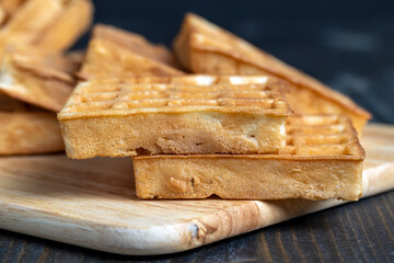 square sweet soft waffles on the table