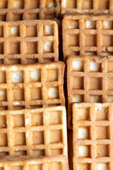 square sweet soft waffles on the table