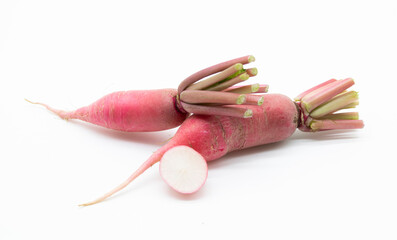 Fresh daikon radishes isolated on white background. red radish. top view
