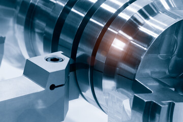 Metal machine tools industry. CNC turning machine high-speed cutting is operation. © Aleksandr Matveev